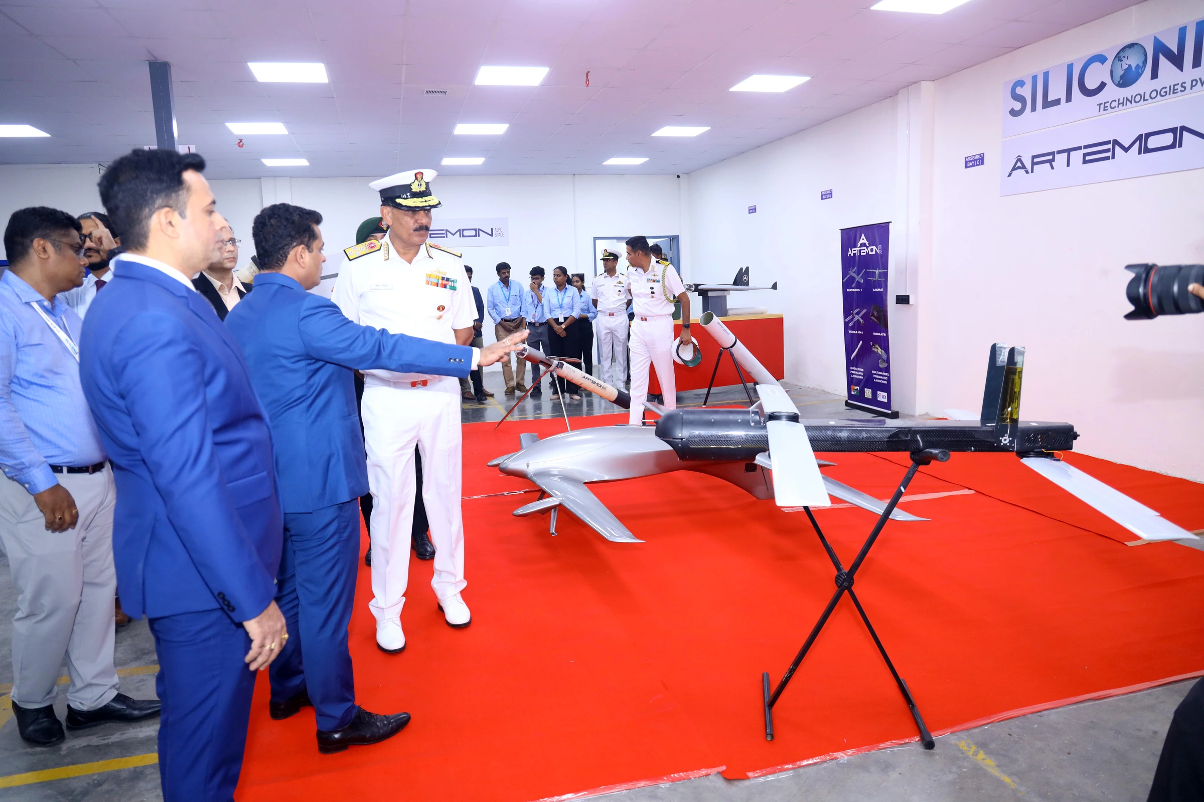 Artemon representatives presenting unmanned aircraft at the facility